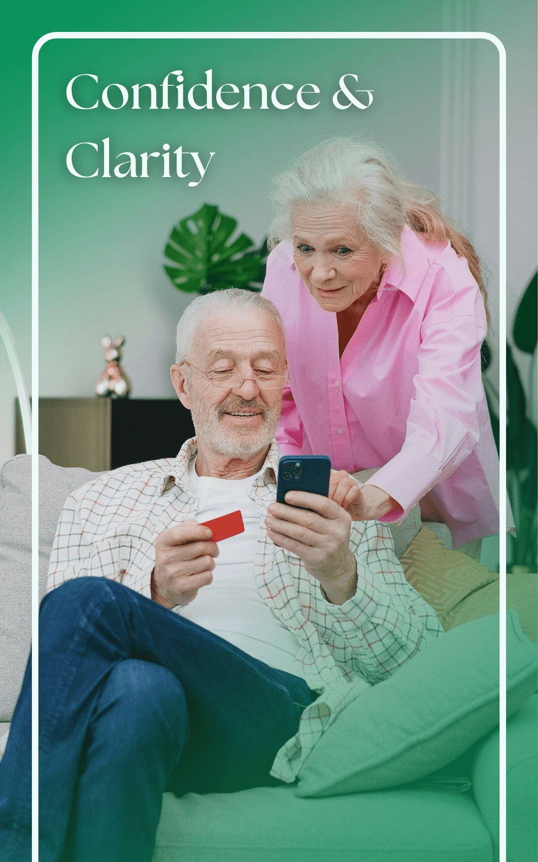 Image showing an older couple purchasing something on their phone with a credit card in their living room